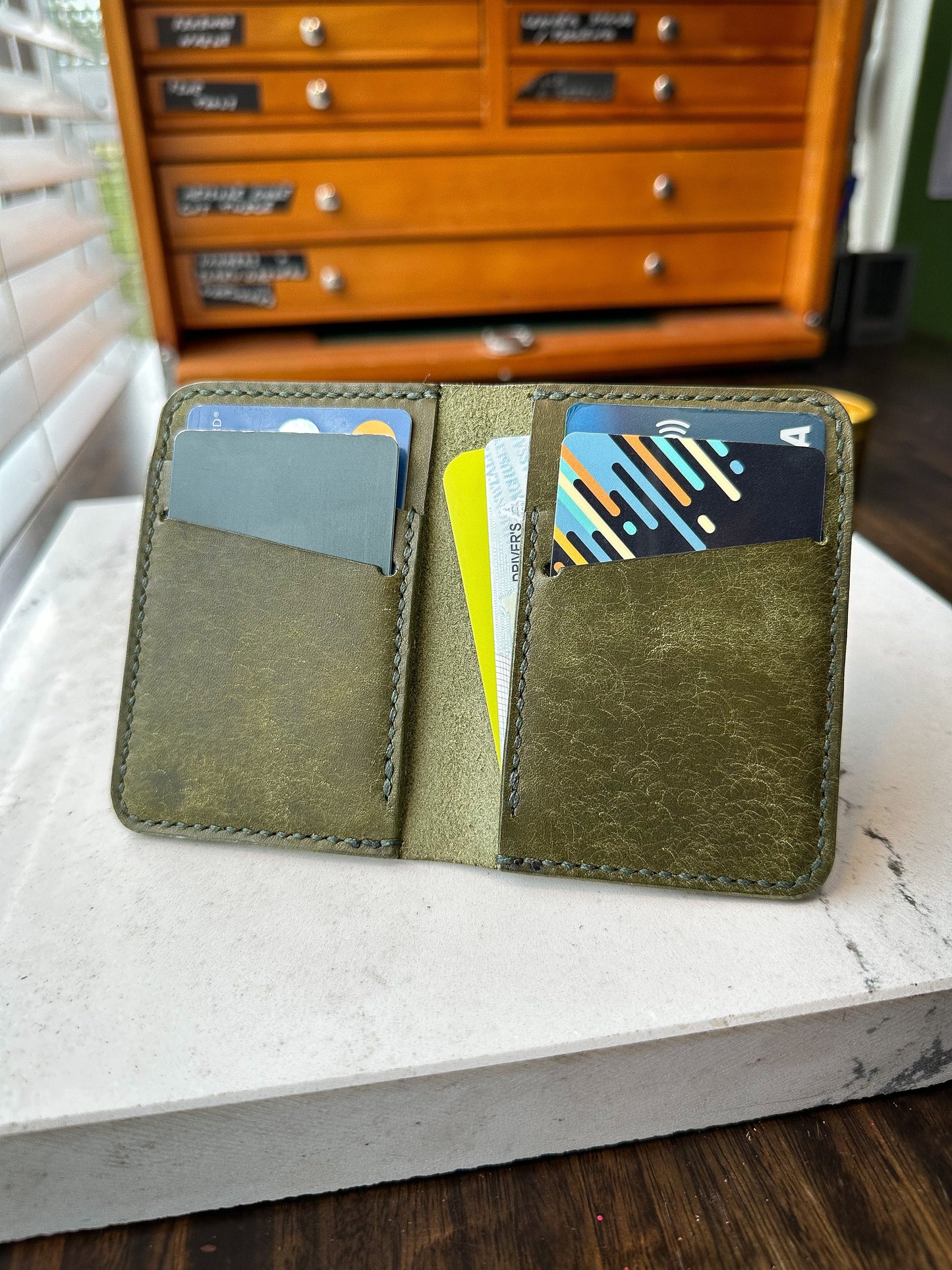 Olive Pueblo Vertical Bifold